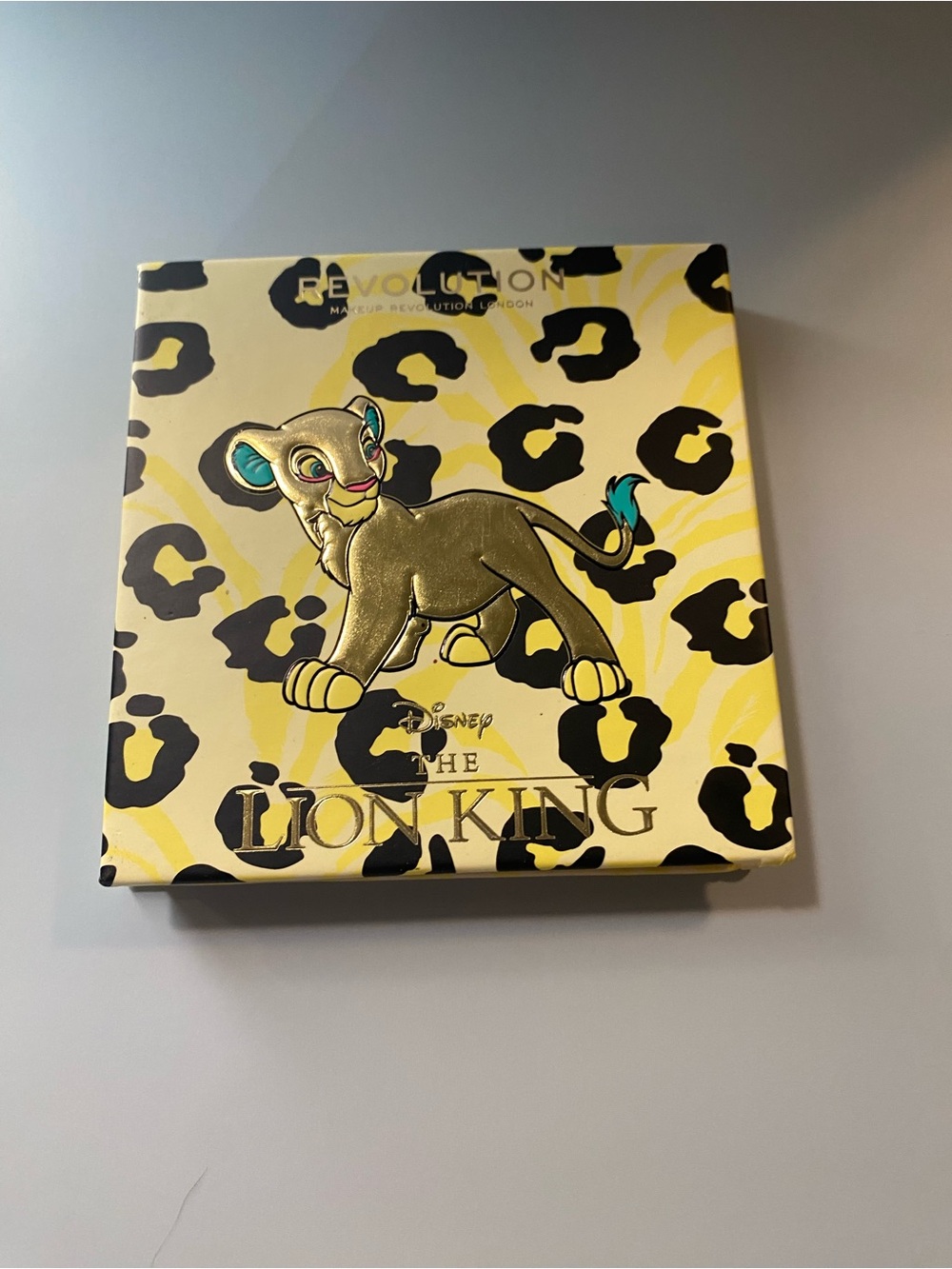 Revolution The Lion King Eyeshadow Palette - Yellow & Black with Teal Accent